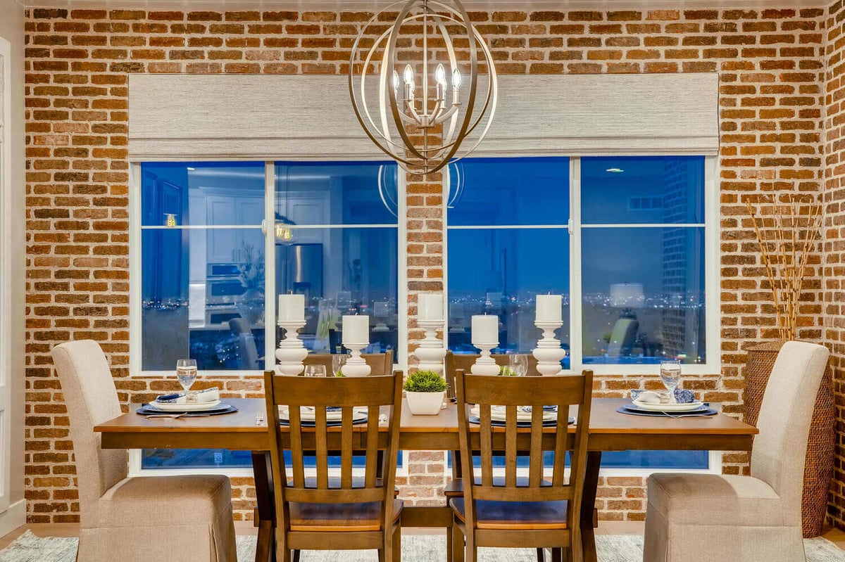 Detailed view of a modern dining table setup in a custom home by Sheffield Homes in Arvada, CO