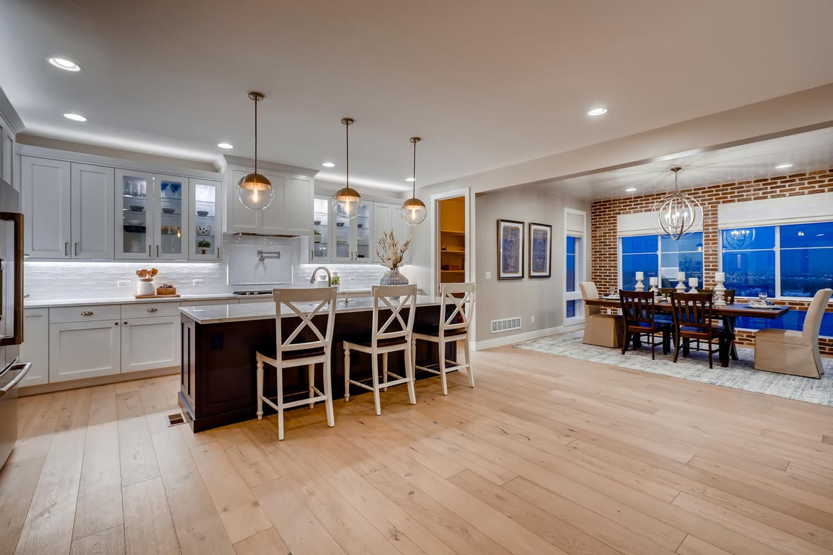 Spacious kitchen with island in a custom home by Sheffield Homes in Arvada, CO
