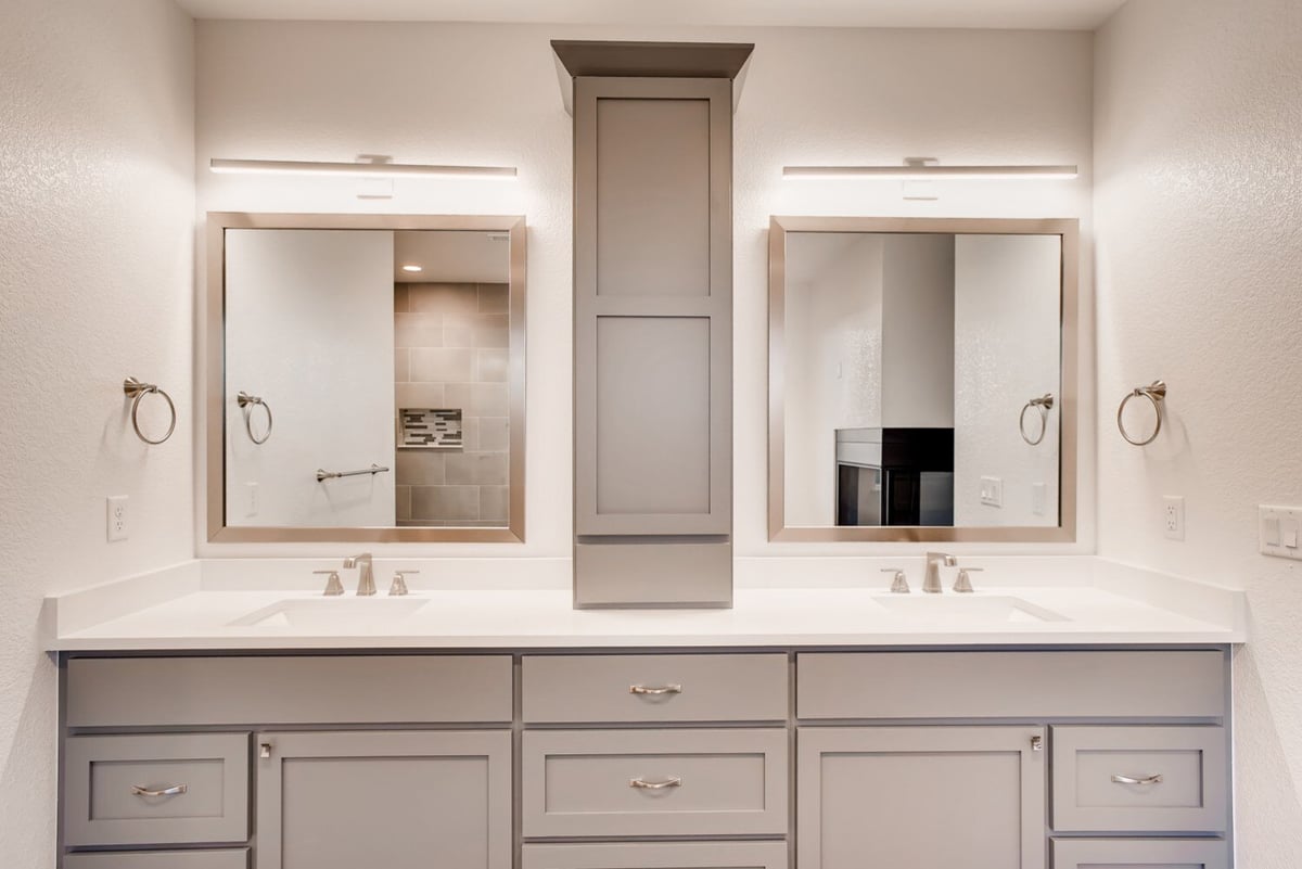 Dual vanity bathroom with modern fixtures in a Sheffield Homes custom home, Arvada, CO