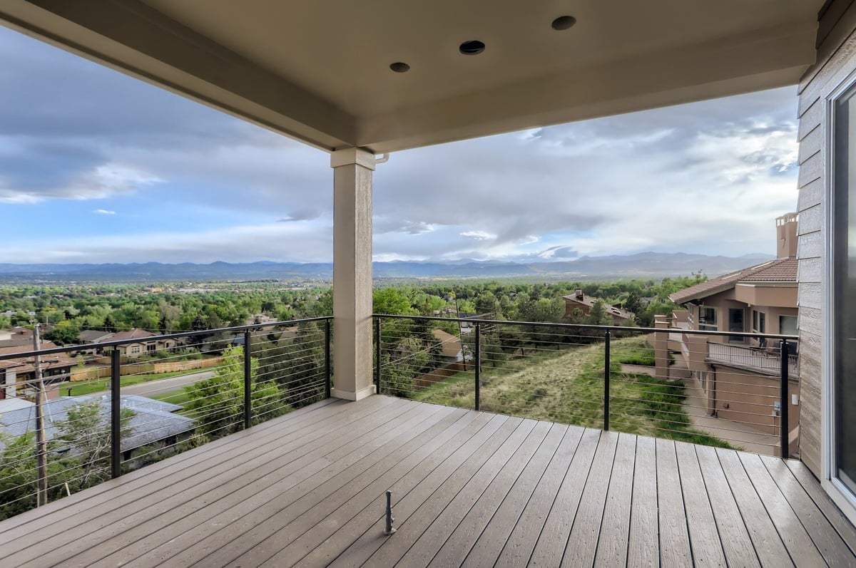 Elevated deck with scenic mountain views in a Sheffield Homes custom home in Arvada, CO
