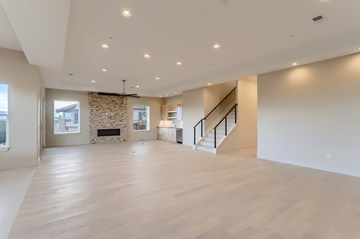 Spacious recreation room with modern finishes in a custom home by Sheffield Homes in Arvada, CO