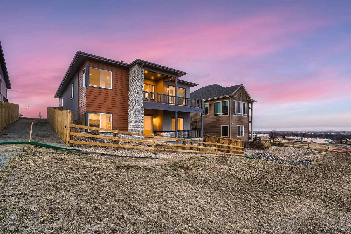 Full exterior rear view of a large custom home built by Sheffield Homes in Arvada, CO