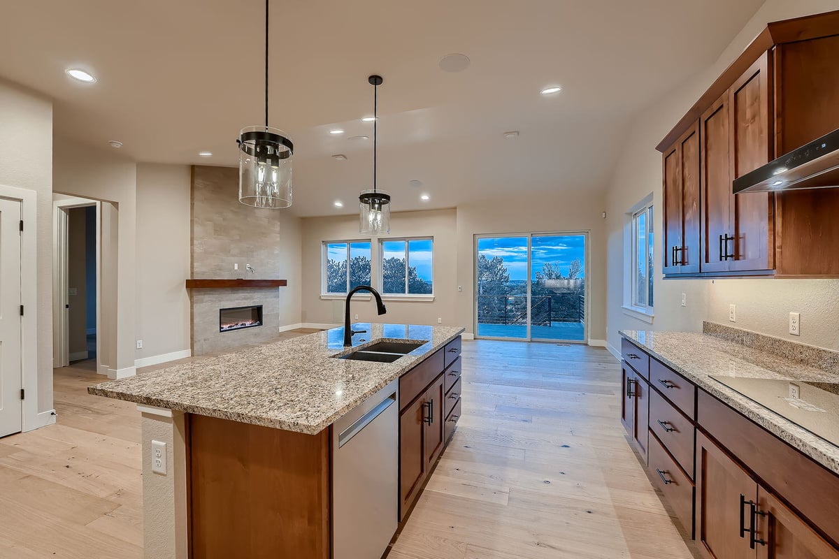Kitchen in a custom-built Sheffield Homes residence, featuring large windows, Denver, CO