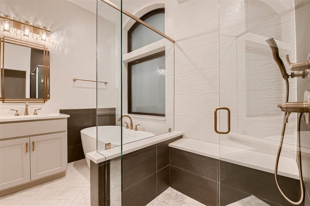 Closeup of a shower enclosure in a modern bathroom of a custom home by Sheffield Homes in Louisville, CO