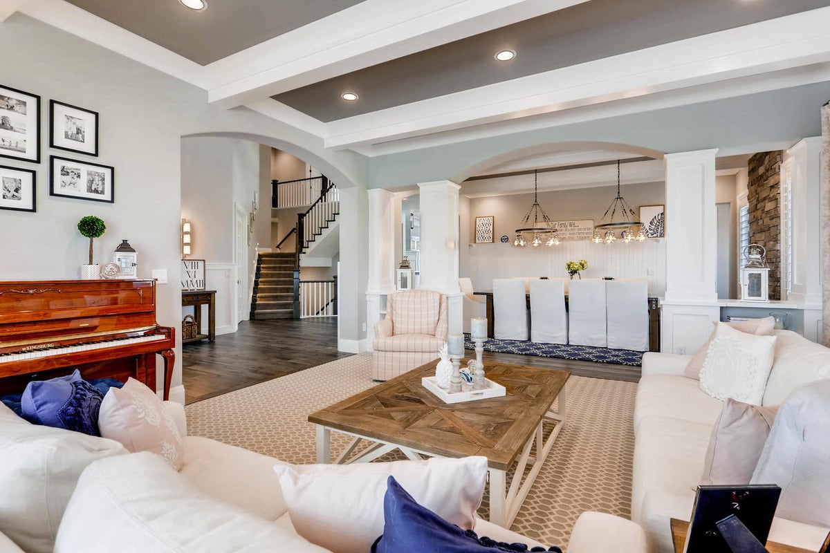 Living room details with sofa sets, a central table, and fine furniture in a custom home by Sheffield Homes in Parker, CO