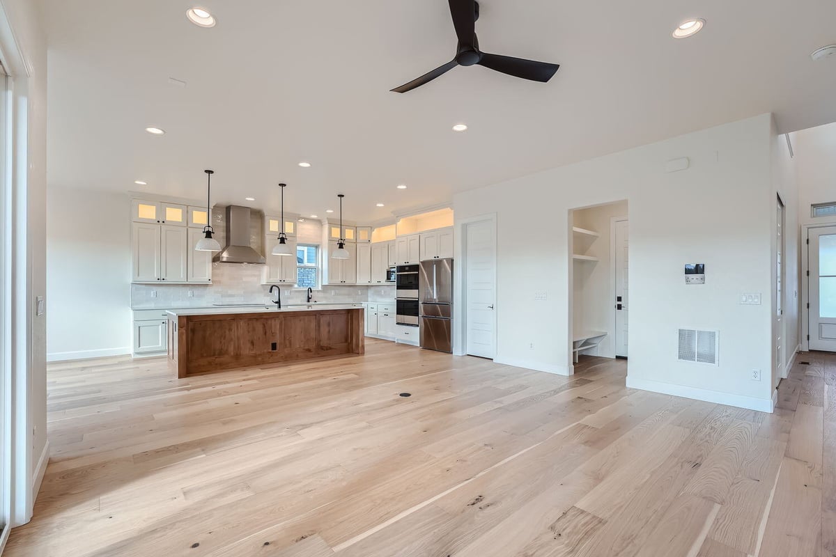 Alternate view of the living room in a custom-built home by Sheffield Homes in Denver, CO, with elegant finishes