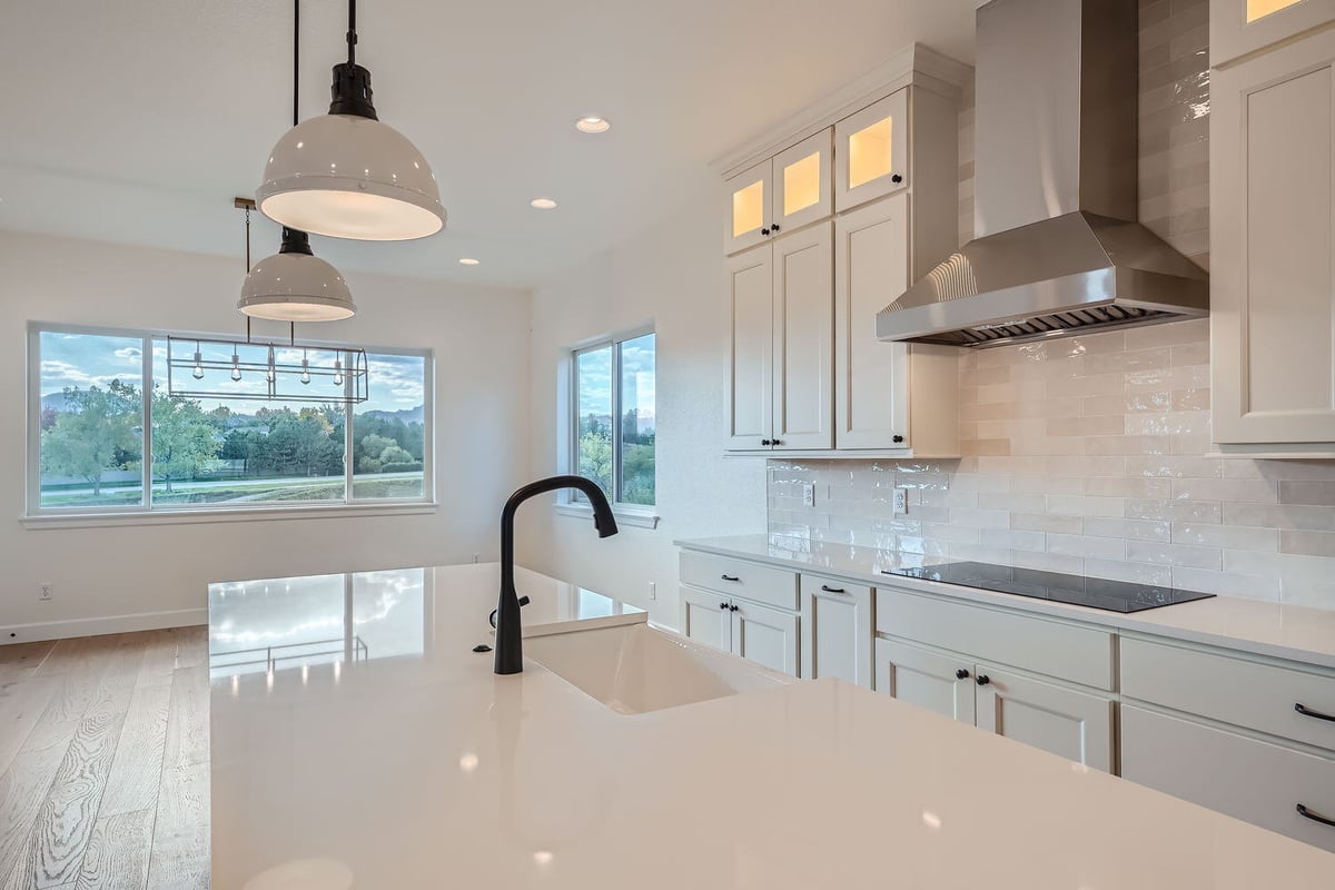 Bright kitchen with a large window view, custom white cabinetry, Sheffield Homes, Denver, CO