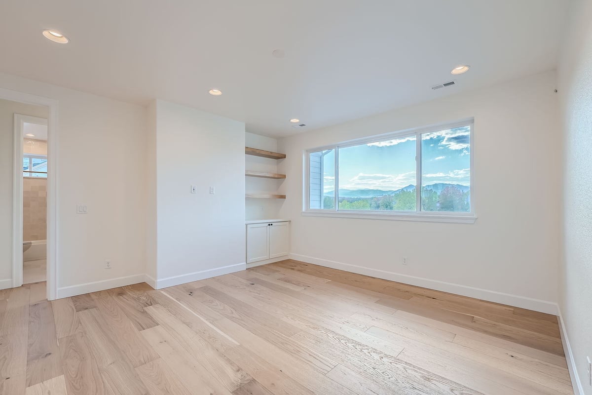 Cozy family room with a large picture window and scenic views, Sheffield Homes, Denver, CO