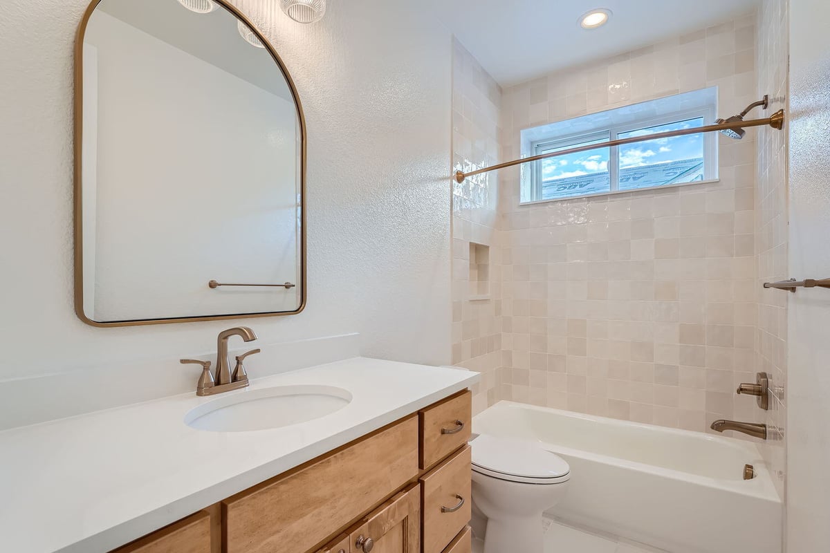 Elegant bathroom with classic white tile and modern finishes, Sheffield Homes, Denver, CO