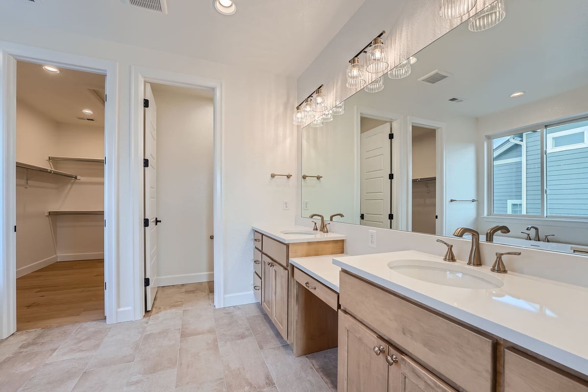 Luxurious primary bathroom with double sinks and glass shower, Sheffield Homes, Denver, CO