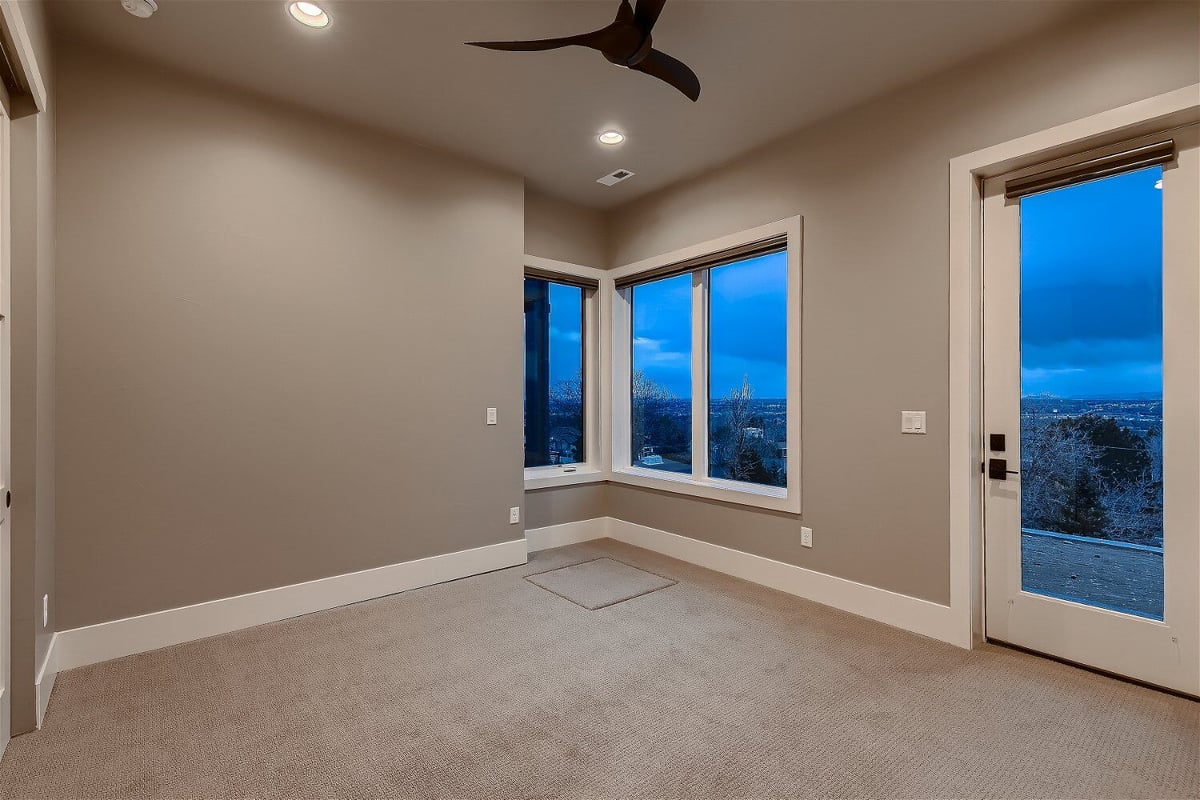 Lower level bedroom in custom home by Sheffield Homes in Denver, CO