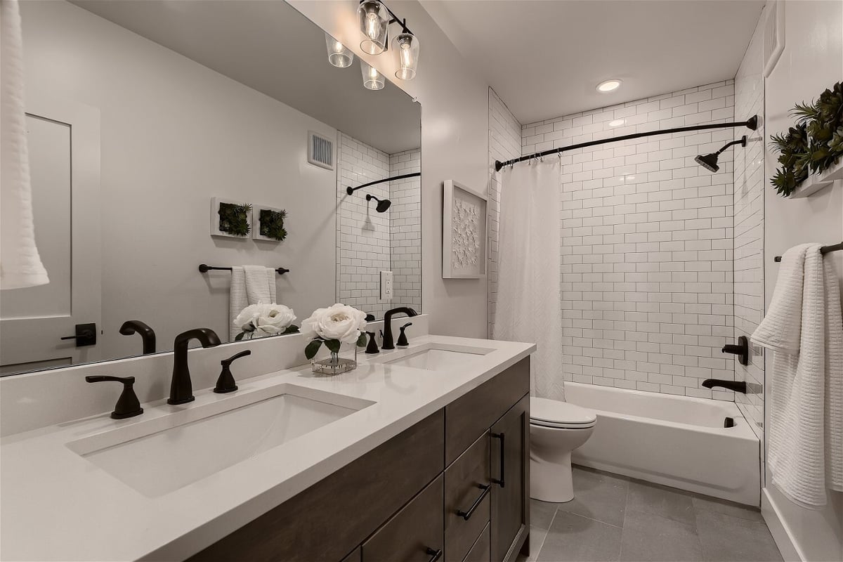 Finished basement bathroom with modern sink design by Sheffield Homes in Denver, CO