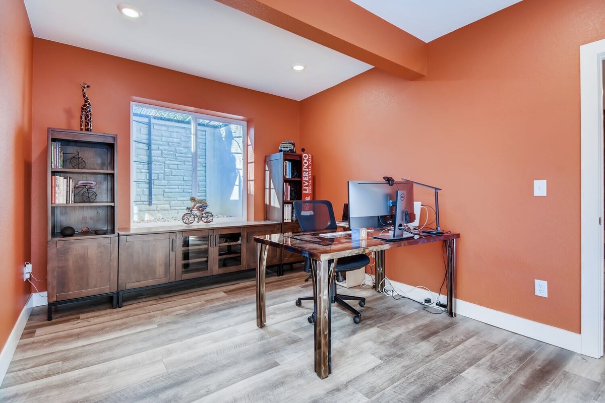 Finished basement bedroom with modern decor by Sheffield Homes in Denver, CO