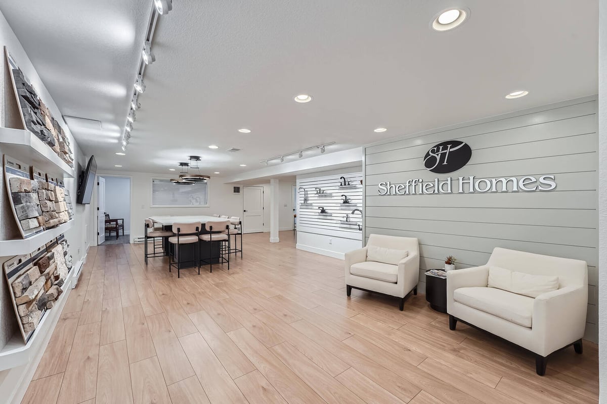 Sheffield Homes showroom entrance in Arvada, CO with design displays